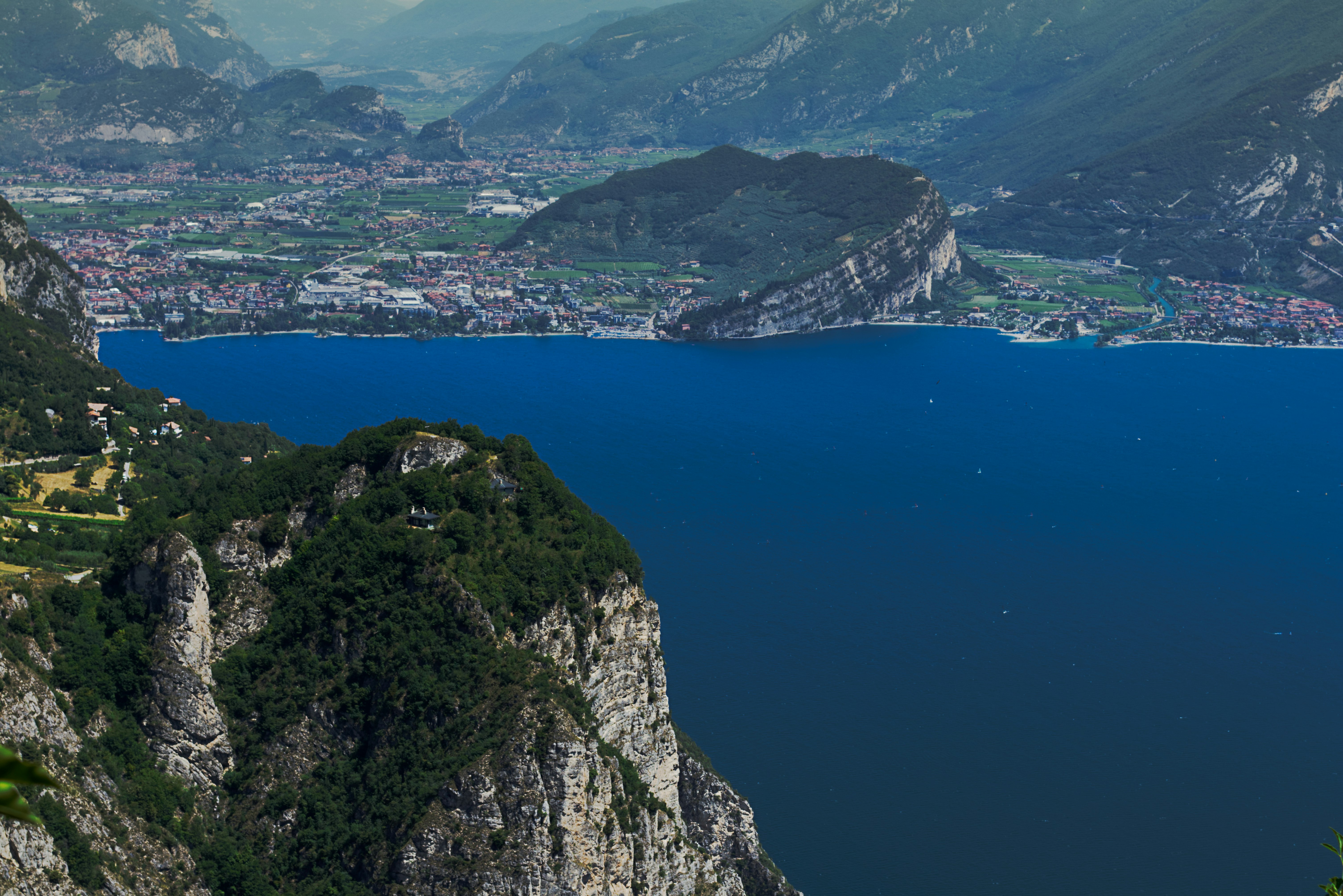 aerial view of lake between mountains during daytime